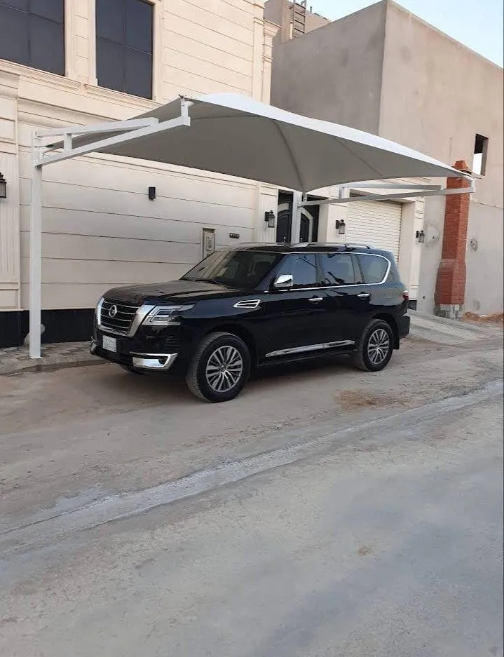 ورشة تصنيع مظلات سيارات في الرياض