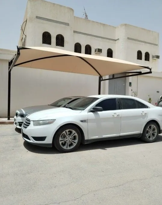 ورشة تصنيع مظلات سيارات في الرياض